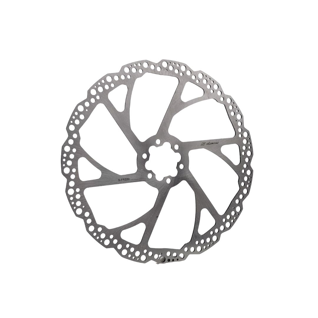 The Warp9 220mm EMoto Front Rotor boasts a circular design with multiple cutouts and a zigzag edge pattern, making it perfect for Talaria Sting MX4 riders seeking reliability and style.