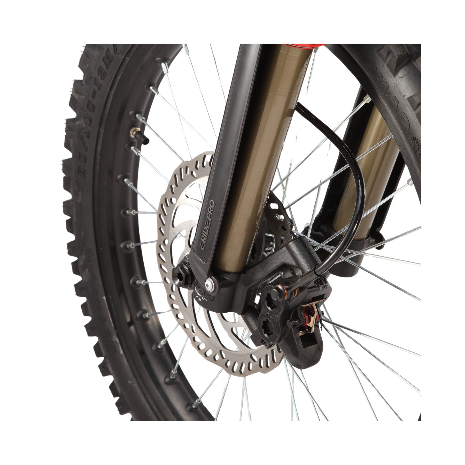 Close-up of an E Ride Pro SS 3.0 mountain bikes front wheel from E-Ride Pro, showcasing the disc brake system with thick, knobby tires, a suspension fork featuring gold and black parts, and spokes converging on a silver brake disc for optimal off-road performance.