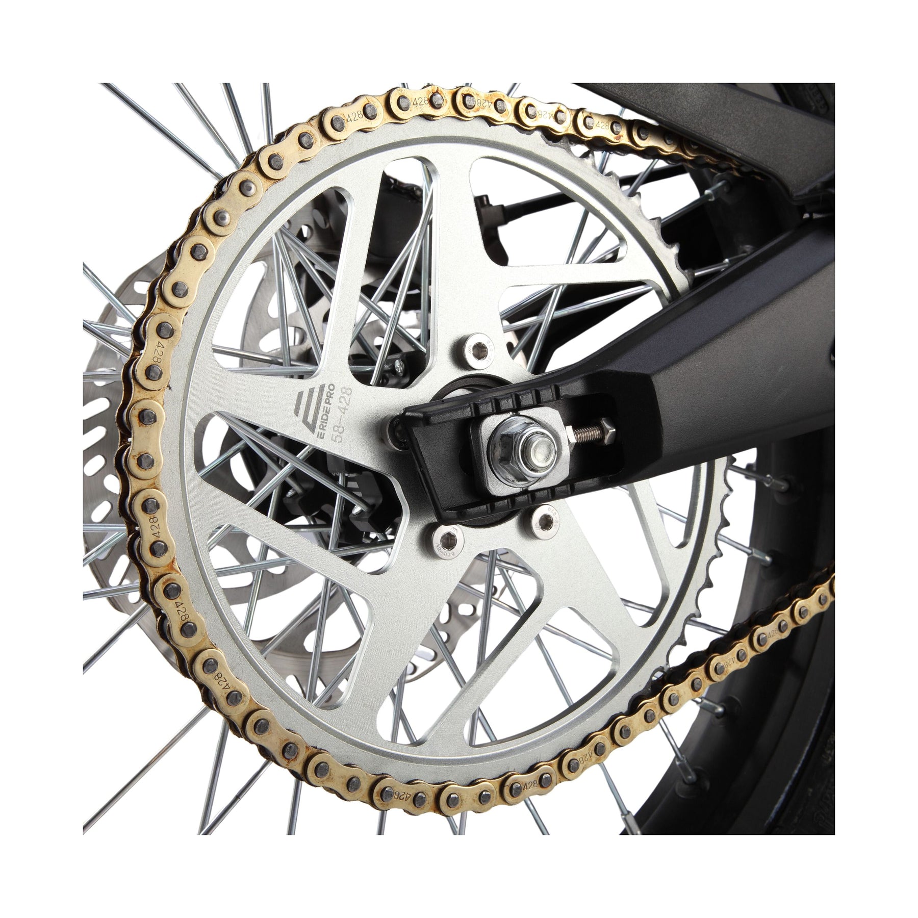 Close-up of the E Ride Pro SS 3.0 by E-Ride Pro features a silver sprocket with intricate designs and a golden chain on the rear wheel. The shiny spokes connect to a black swingarm, set against a white background, emphasizing its advanced BMS system for seamless performance.
