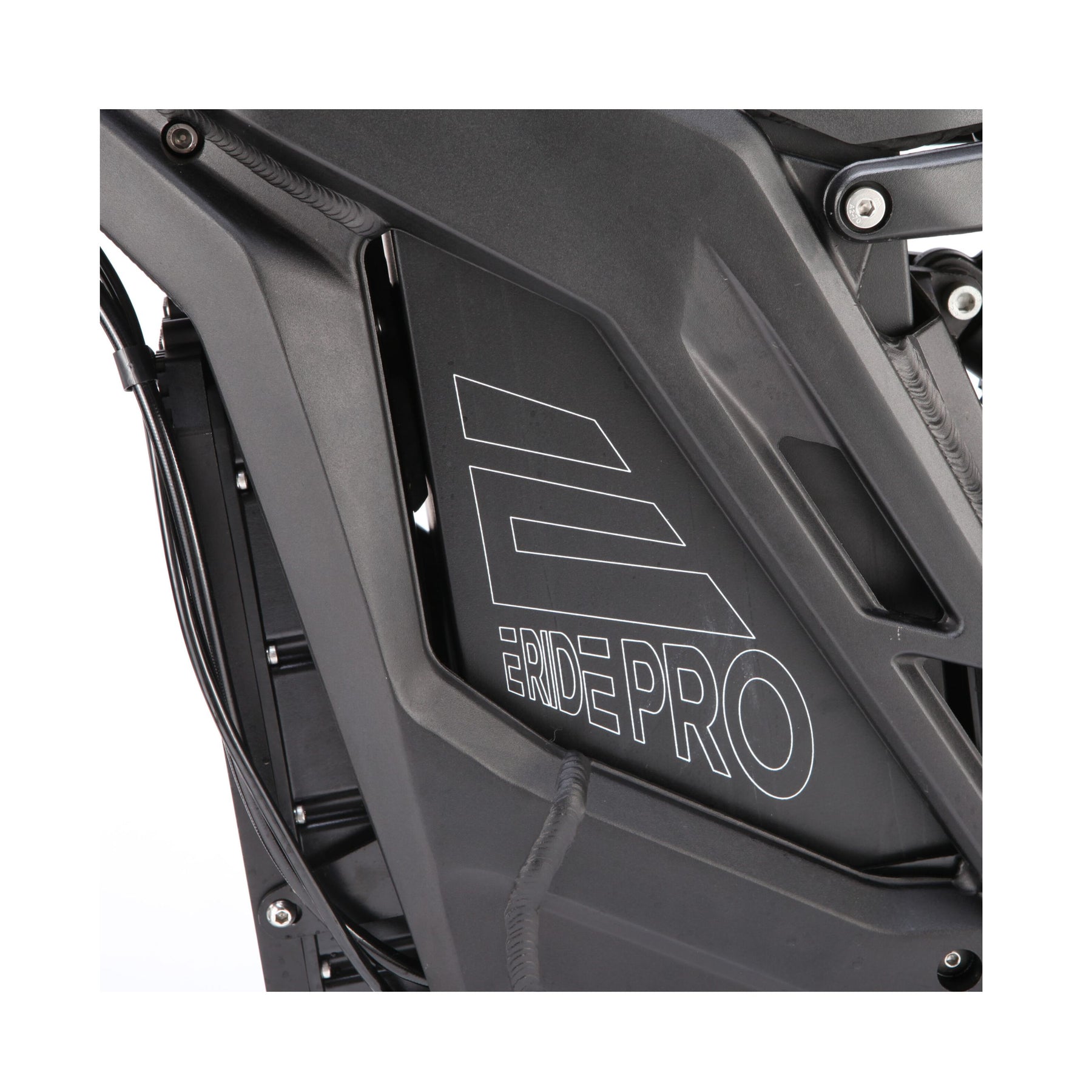 Close-up of a black motorcycle frame with E-Ride Pro in white, highlighting the E Ride Pro SRs angular, sleek design lines and advanced suspension for a smoother ride.