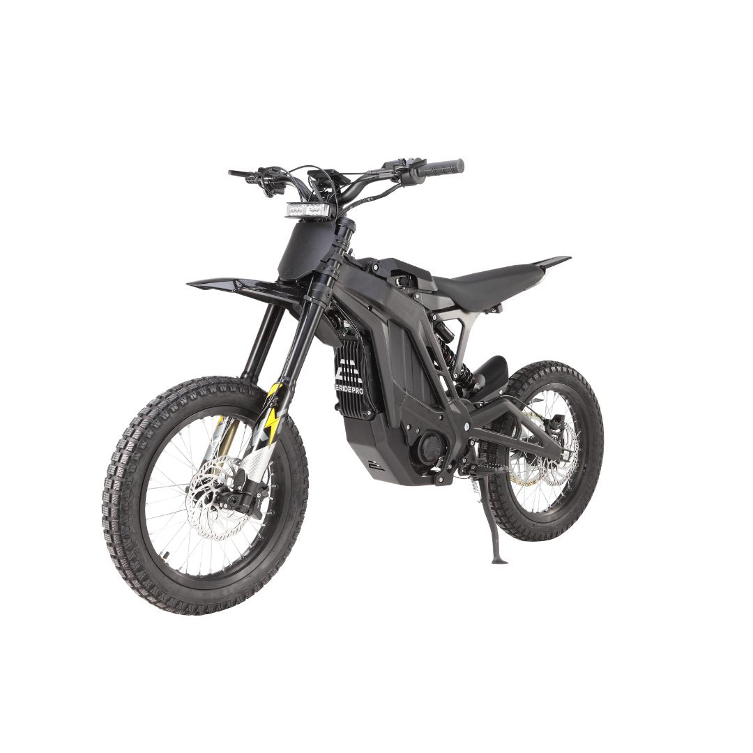 The E Ride Pro S by E Ride Pro is a sleek black electric dirt bike with 16 knobby tires, disc brakes, and a minimalist design. Its 6kw power, robust suspension system, and wide handlebars make it ideal for off-road adventures.