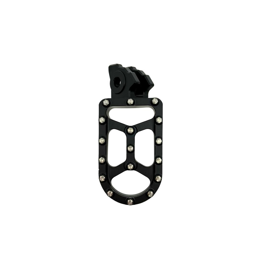 Talaria MX5 Footpeg by Talaria in black metal with an open design and silver pins along the edge, perfect for high-performance riding, shown on a white background.