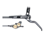 Close-up of a black 79Bike Falcon Pro Brake Cylinder Pump Assembly, showcasing the branded lever and hydraulic caliper with copper accents connected by tubing against a white background, making it an ideal replacement part.