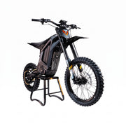 Arctic Leopard XF Pro electric moto, front three-quarter view on bike stand, black KKE forks