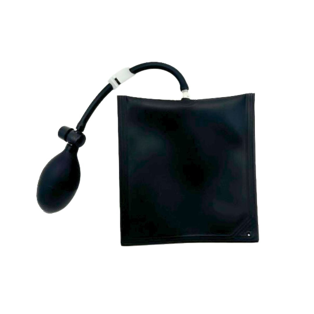 The Amped Bikes Battery Air Wedge Bag is a black, fiber-reinforced TPU inflatable shim with a rubber bulb attached to a flat, rectangular bag, ideal for lifting or separating objects. Product shown on a plain white background.