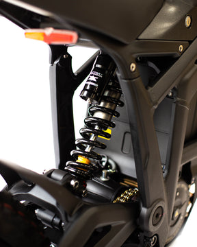Closeup of the rear shock on the back of the Sting MX4