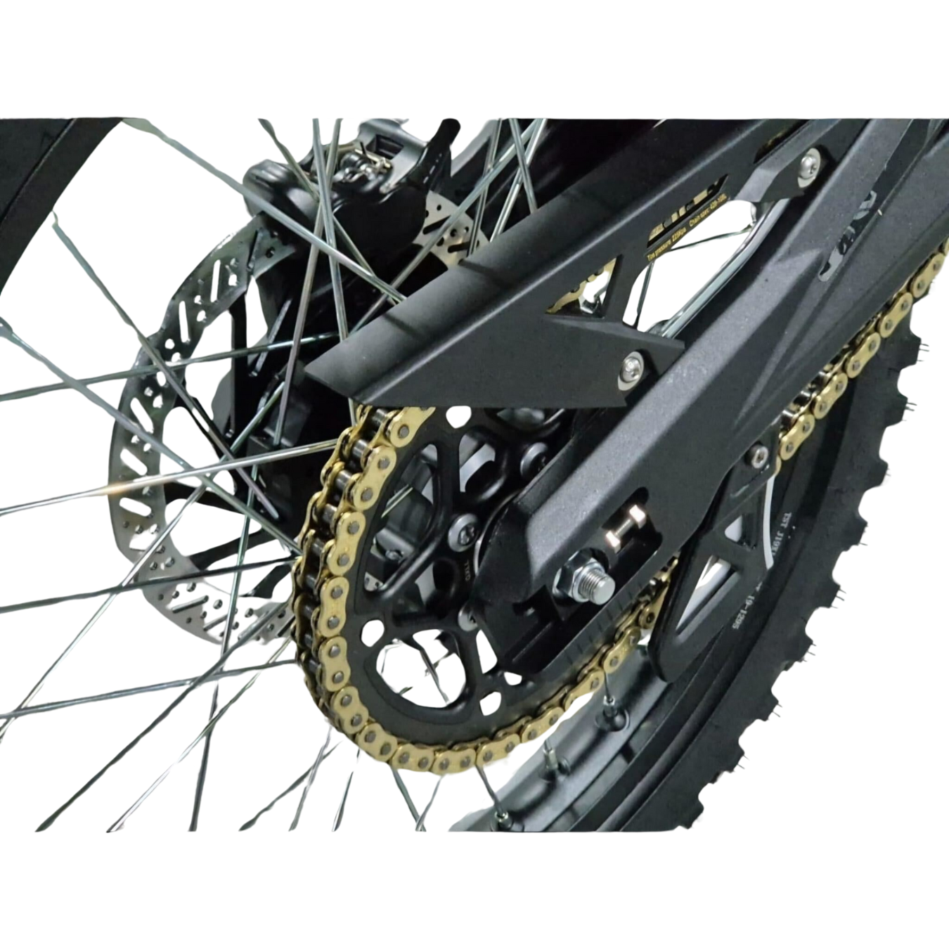 A close-up of the Talaria Sting MX5 Pro reveals its gold chain, black frame, disc brake, spokes, and treaded tire. This image emphasizes the mechanical features of this electric dirt bike with a 72V/40Ah battery.