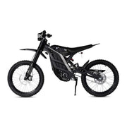 The 79Bike Falcon Pro, a 72V electric dirt bike from 79Bike, features off-road tires, a slim black frame, front and rear suspension, and a side stand—built for agility and control. Shown from the left against a white background.