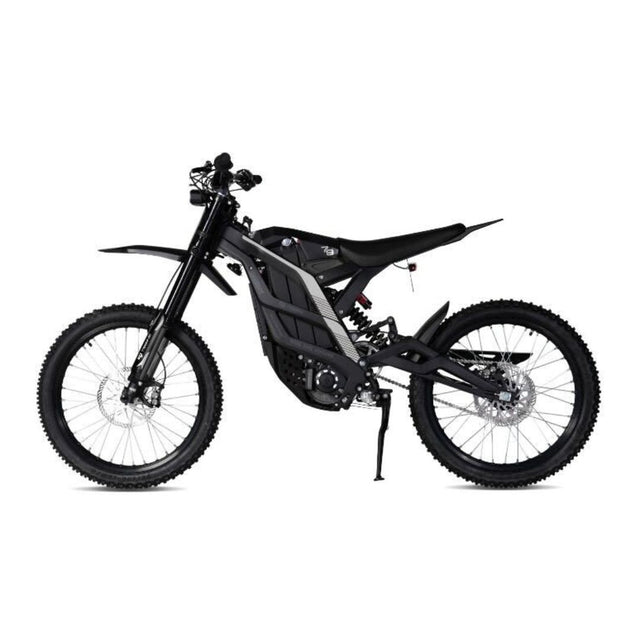 The 79Bike Falcon Pro, a 72V electric dirt bike from 79Bike, features off-road tires, a slim black frame, front and rear suspension, and a side stand—built for agility and control. Shown from the left against a white background.