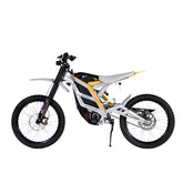 The 79Bike Falcon Pro, a 72V electric dirt bike by 79Bike, boasts a sleek white and gray frame with black tires and yellow accents. It features a minimalist design with visible suspension components and off-road capabilities, showcased against a plain white background.