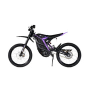 The 79Bike Falcon Pro, a 72V electric dirt bike, showcases a black frame with purple accents. It features off-road tires, front and rear suspension, and a minimalist seat. Displayed in side profile on a white background.