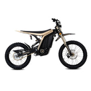 79Bike Lynx electric motorcycle in gold and black, side view showing the frame, suspension, and knobby off-road tires.