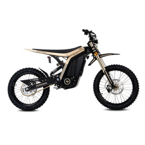 79Bike Lynx electric motorcycle in gold and black, side view showing the frame, suspension, and knobby off-road tires.