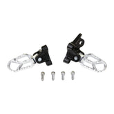 A set of Razor Stage2 Footpegs in silver and black, with mounting brackets for electric dirt bikes, shown with four silver screws on a white background.