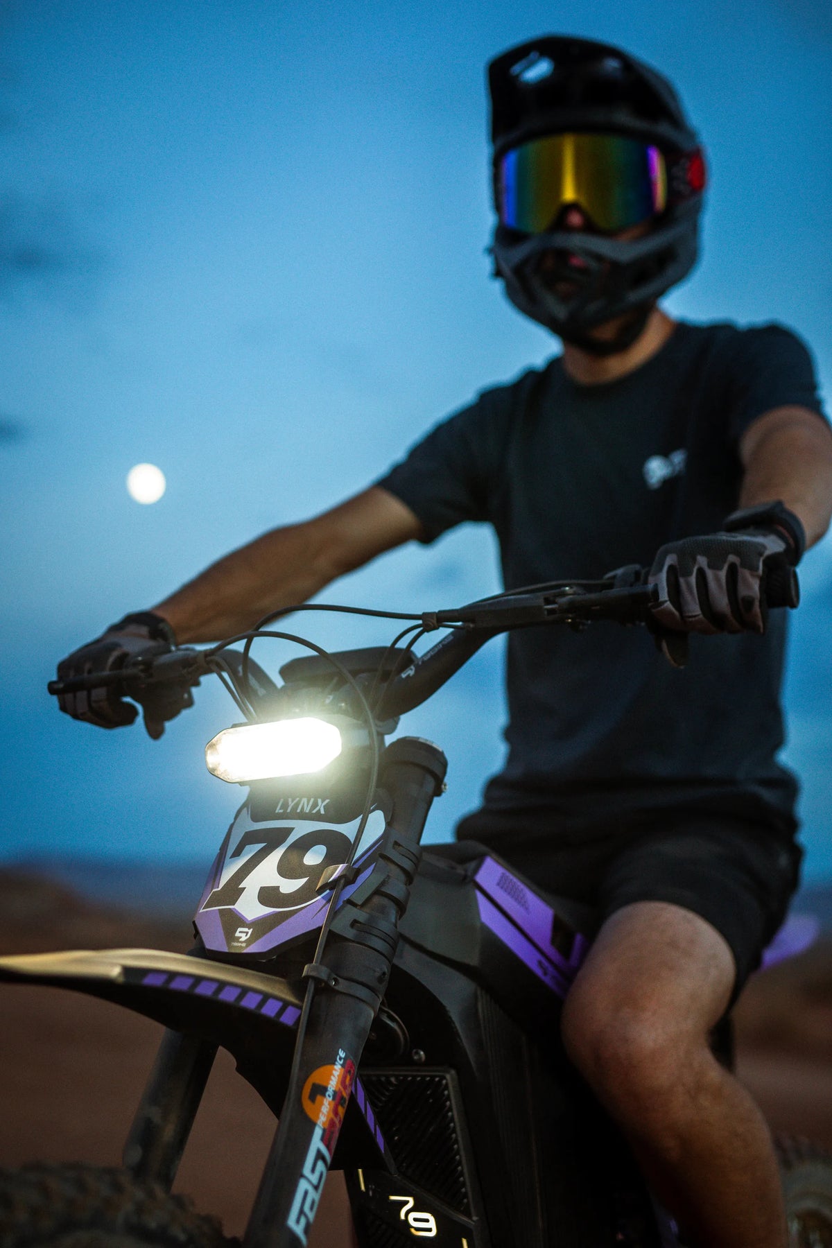 79Bike Lynx rider portrait at dusk, headlight on